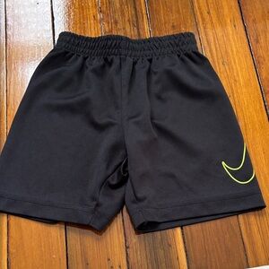 Nike Black Kids Shorts with Neon Yellow Swoosh